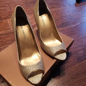 Gold open toe pumps